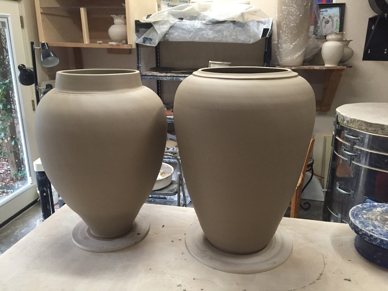 I was on a coil binge after everyone left after the holidays  Pots are 24" tall and @ 45 and 55 pounds respectively