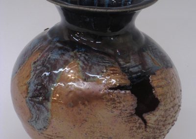 item # 242   7" x 7"  Split  and Torn Vase