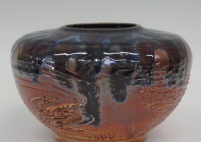 #353 4 1/2″ x 7″  $135  textured jar