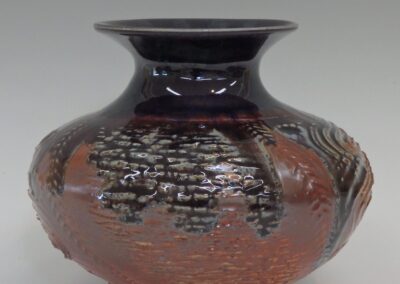 #358  7″ x 8 1/2″  $195  textured vase