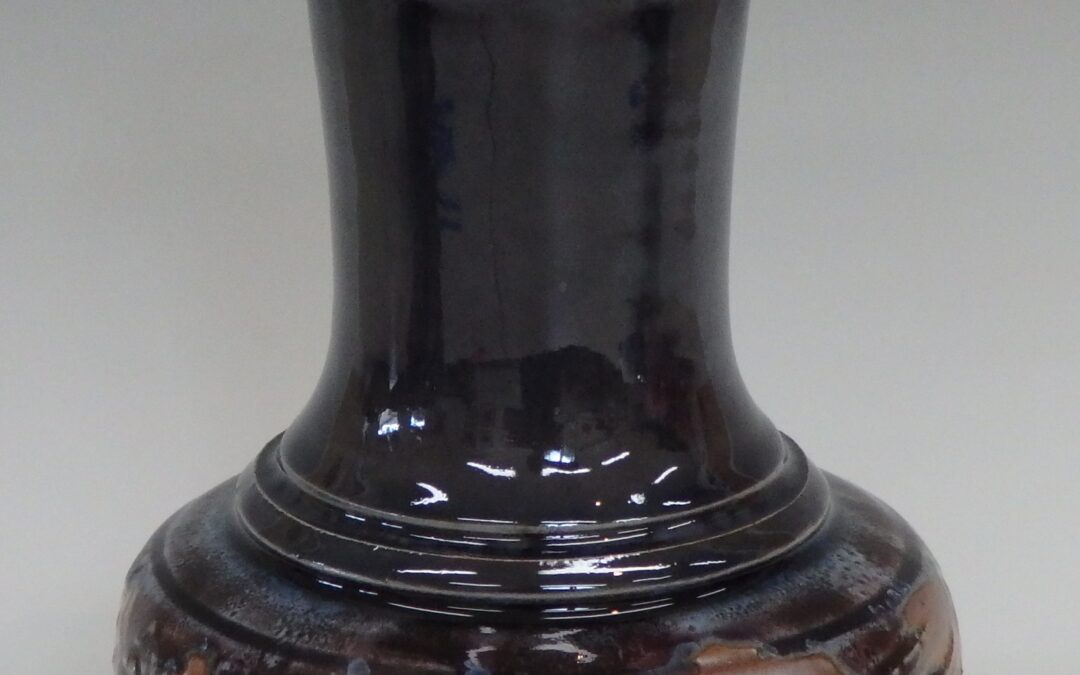 #363  8 1/2″ x 6″  $90  textured vase